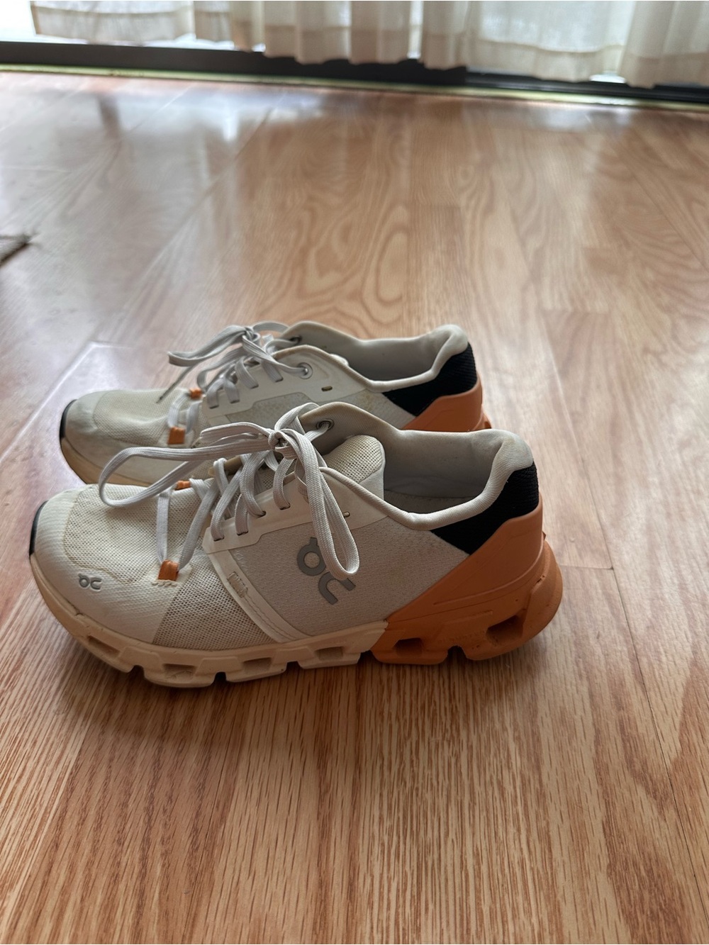 On Running Women's Athletic Shoes in Cream and Orange